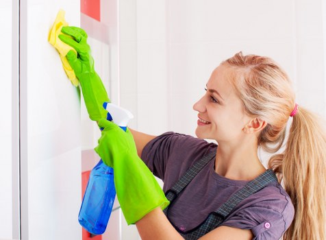 Professional cleaner confirming a service booking and schedule